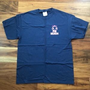 Pig Beach T. blue with pink font. Size M.